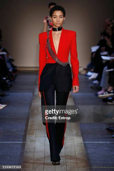 A model walks the runway at the Alexander McQueen show at Paris... News ...