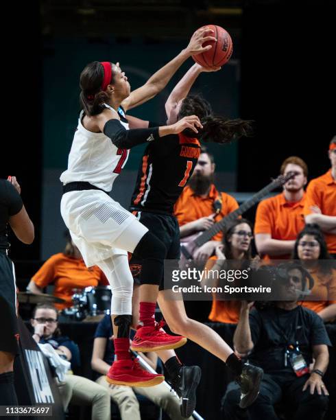 Louisville Cardinals Guard Asia Durr blocks a shot attempt by Oregon State Beavers Guard Aleah Goodman during the second half of the game between the...