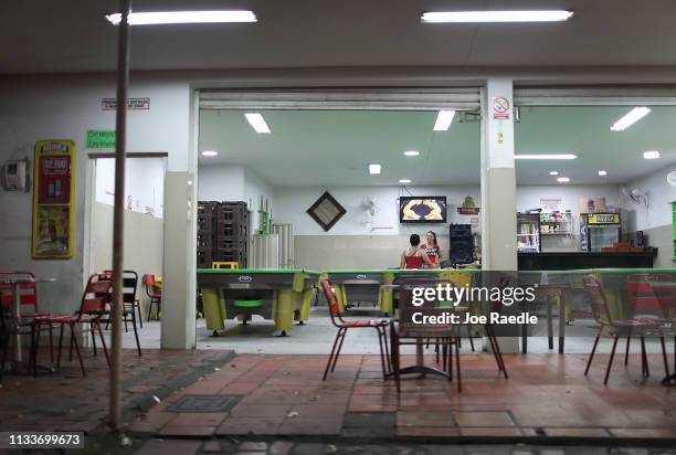 Customers are seen in a shop as the town sees an influx of Venezuelans that are crossing the border on March 4, 2019 in Cucuta, Colombia. Many...
