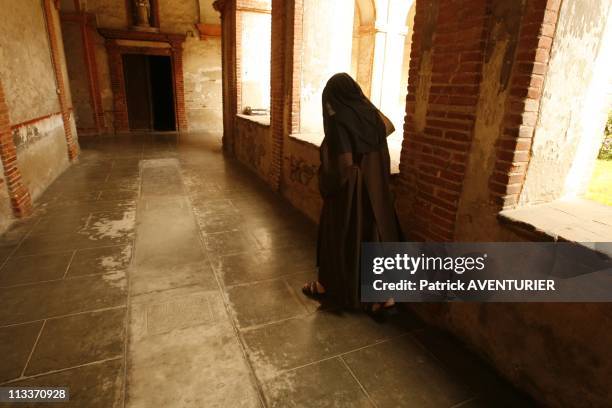 The Last Carmelite Sisters In Pamiers, France On July 29, 2008 - Saint Therese of the Child Jesus , prioress of the Caramel pray behind the gates of...