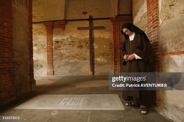 The Last Carmelite Sisters In Pamiers, France On July 29, 2008 - Saint Therese of the Child Jesus , prioress of the Caramel pray behind the gates of...