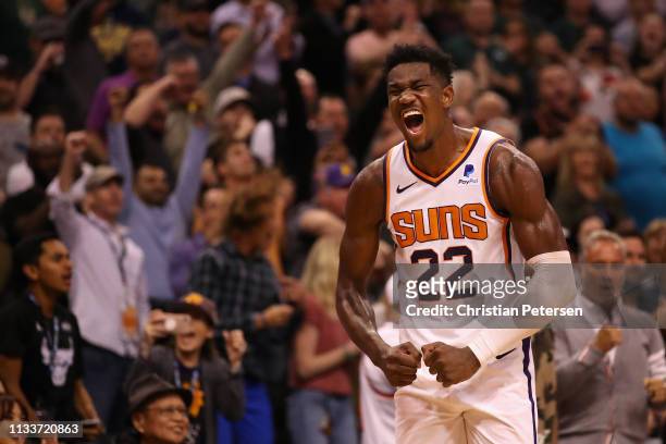 Deandre Ayton of the Phoenix Suns reacts during the final moments of the NBA game against the Milwaukee Bucks at Talking Stick Resort Arena on March...