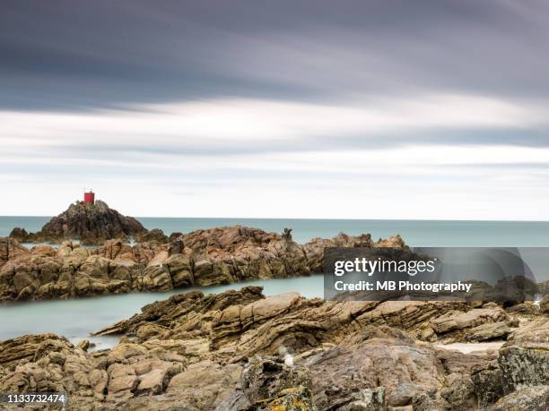 mount maunganui rocks - mount maunganui stock pictures, royalty-free photos & images