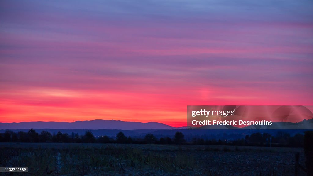 Pink light in the sky