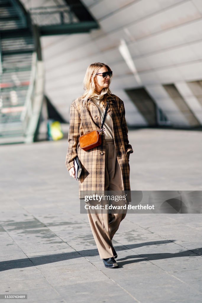 Street Style - Paris Fashion Week Womenswear Fall/Winter 2019/2020 : Day Eight