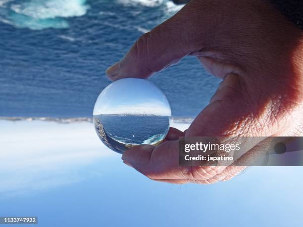 seascape through a crystal ball - olas rompientes stock pictures, royalty-free photos & images