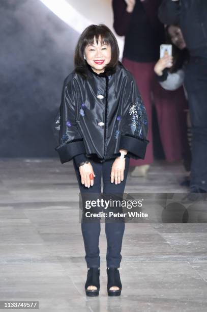 Fashion designer Shiatzy Chen acknowledges the audience at the end of the Shiatzy Chen show as part of the Paris Fashion Week Womenswear Fall/Winter...