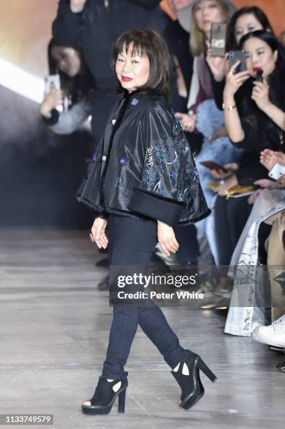 Fashion designer Shiatzy Chen acknowledges the audience at the end of the Shiatzy Chen show as part of the Paris Fashion Week Womenswear Fall/Winter...