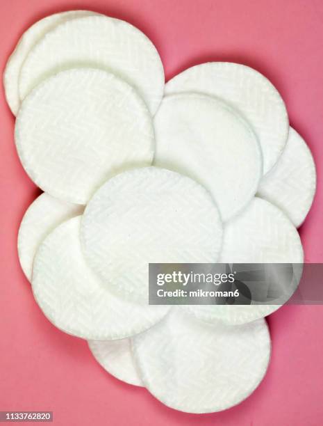 facial wiping cotton pads - cotton pad stock pictures, royalty-free photos & images