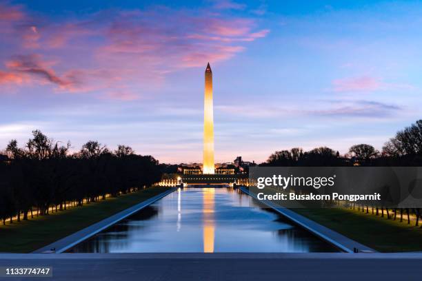 scenic view of sunset over city at washington dc in usa - national mall stockfoto's en -beelden