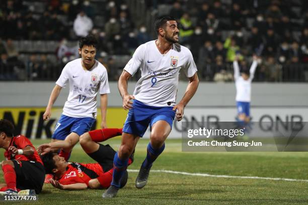 Graziano Pelle of Shandong Luneng celebrates scoring a first goal during the AFC Champions League Group E match between Gyeongnam and Shandong Luneng...