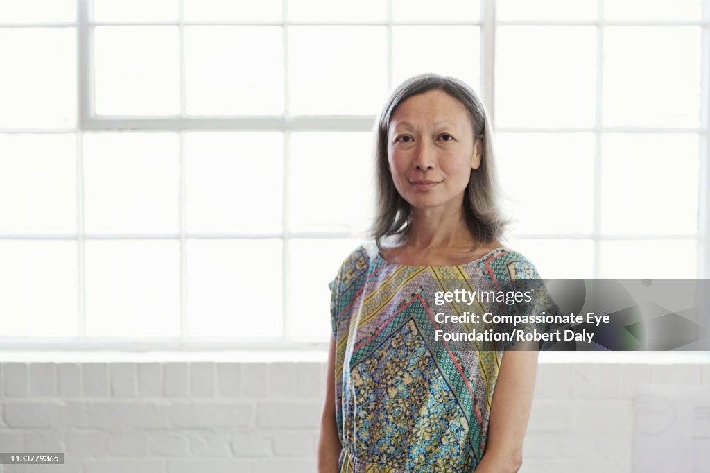 Portrait of mature businesswoman in office