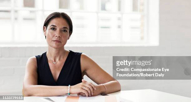 portrait of serious businesswoman in office - cef do not delete stock pictures, royalty-free photos & images