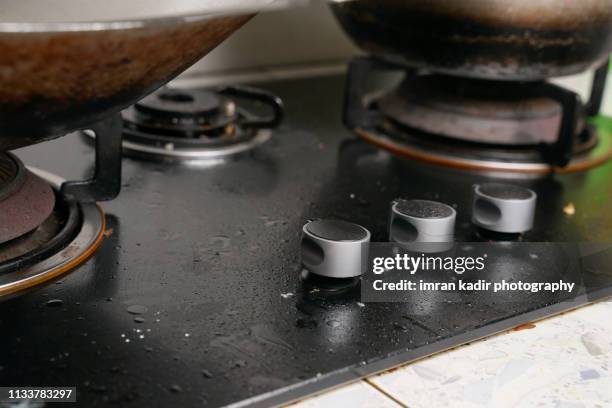 pots in the dirty gas stove - dirty pan stock pictures, royalty-free photos & images