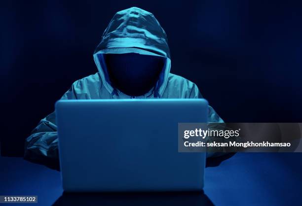hacker attacking internet - hacker stock pictures, royalty-free photos & images