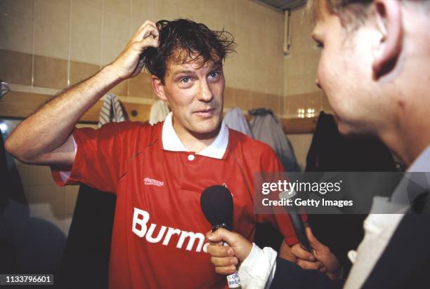 Swindon Town player manager Glenn Hoddle is interviewed in the dressing room after a match circa 1993 in Swindon, United Kingdom.