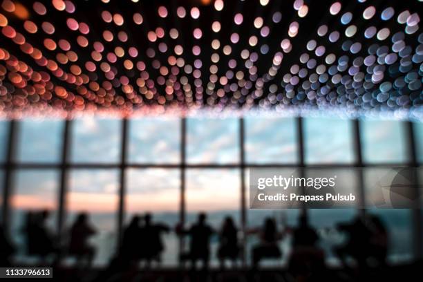 blurred background of restaurant with abstract bokeh light - blurred motion restaurant stock pictures, royalty-free photos & images