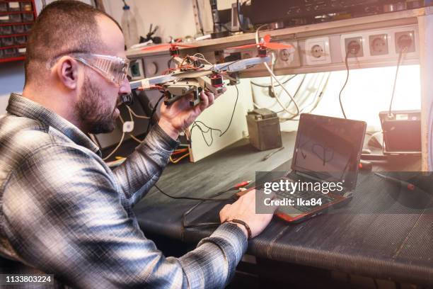 work in an electric workshop - computer hardware engineer stock pictures, royalty-free photos & images
