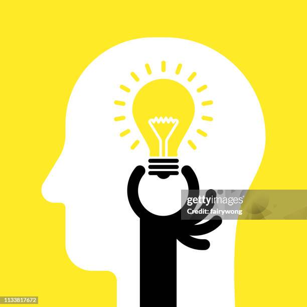 hand put an idea light bulb in a people's head - deformed hand stock illustrations