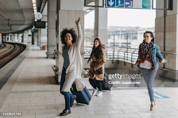 Friends Catching Train Friends Catching Train Photos and Premium High Res Pictures - Getty Images