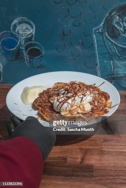 belgian banana waffle - servierfertig stock pictures, royalty-free photos & images