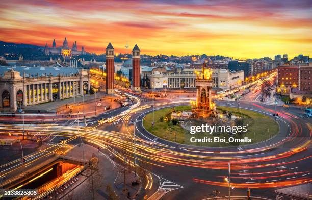 plaça d'espanya (plaza de españa - spain square) long exposure at sunset in barcelona - barcelona spain stock pictures, royalty-free photos & images