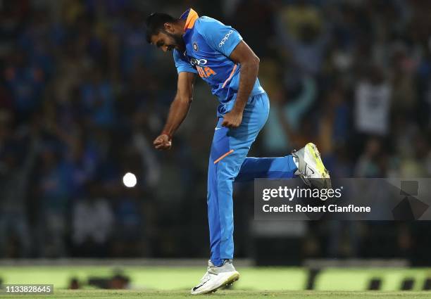 Vijay Shankar of India celebrates taking the wicket of Marcus Stoinis of Australia during game two of the One Day International series between India...