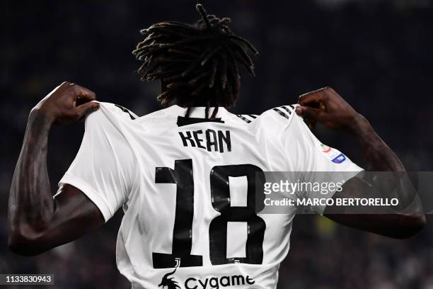 Juventus' Italian forward Moise Kean celebrates after opening the scoring during the Italian Serie A football match Juventus vs Empoli on March 30,...