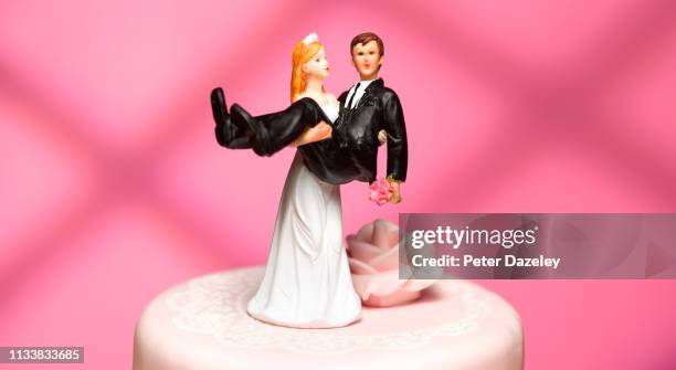 bride and groom wedding figurines - just married couple stock pictures, royalty-free photos & images