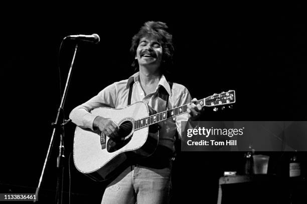 Singer-songwriter John Prine performs at Atlanta Symphony Halll on April 23, 1975 in Atlanta, Georgia.