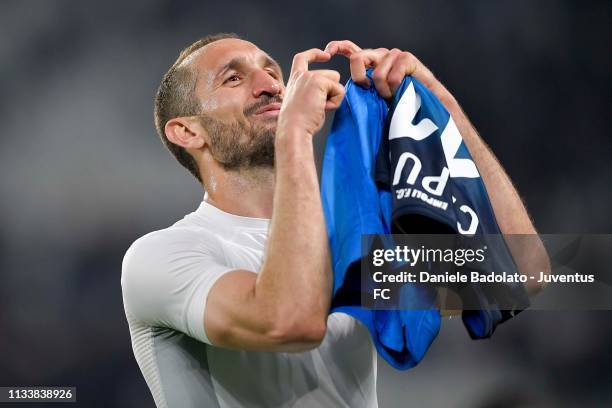 Giorgio Chiellini of Juventus greets the fans and celebrates the victory at the end of the Serie A match between Juventus and Empoli at Allianz...