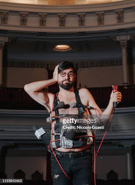 Comedian Manu Sanchez poses with a false explosive belt during a portrait session in the Theater of Command of a military district at Plaza de...