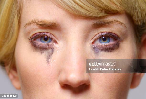 young woman crying - mascara stock-fotos und bilder