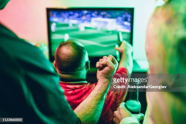 friends happy about their favorite club winning soccer match - sports round stock pictures, royalty-free photos & images