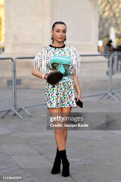 Emma Chamberlain attends the Louis Vuitton show as part of the Paris Fashion Week Womenswear Fall/Winter 2019/2020 on March 05, 2019 in Paris, France.