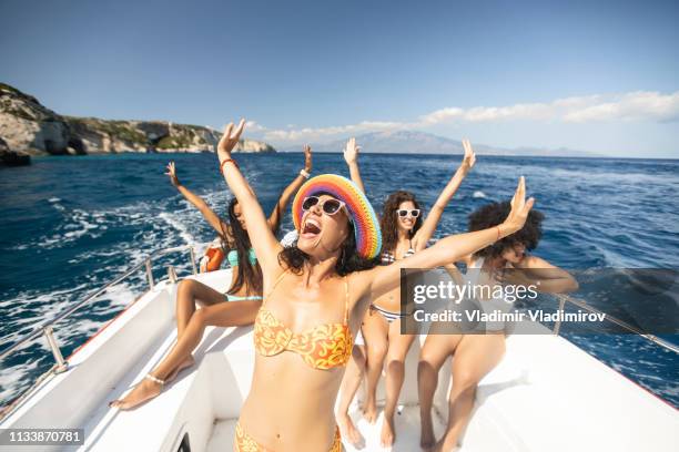 group of friends yachting and having fun - greece tourism stock pictures, royalty-free photos & images