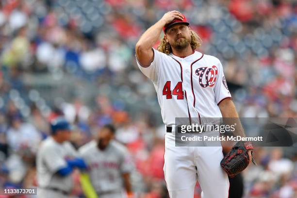 Trevor Rosenthal of the Washington Nationals reacts after giving up a two-run RBI single to J.D. Davis of the New York Mets in the eighth inning at...