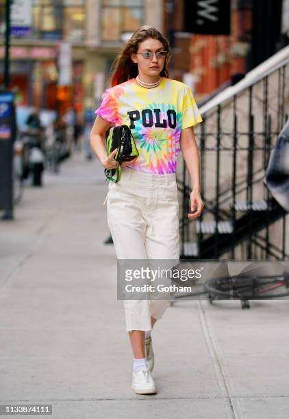 Gigi Hadid wears a tie-dyed shirt on March 30, 2019 in New York City.
