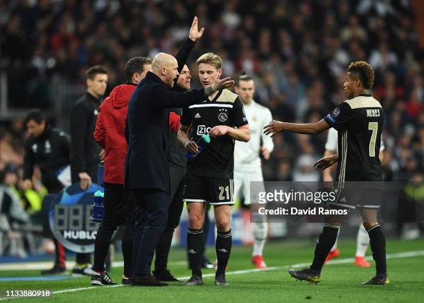 Erik Ten Hag, Manager of Ajax gives instructions to Frenkie de Jong during the UEFA Champions League Round of 16 Second Leg match between Real Madrid...