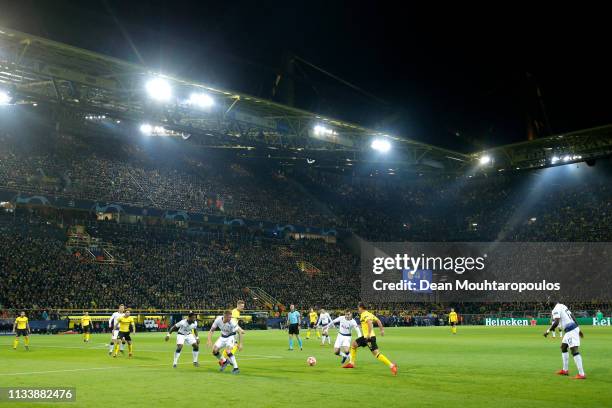 General view as Mario Gotze of Borussia Dortmund takes on Harry Winks of Tottenham Hotspur during the UEFA Champions League Round of 16 Second Leg...
