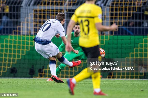 Harry Kane of Tottenham scores his team's first goal during the UEFA Champions League Round of 16 Second Leg match between Borussia Dortmund and...