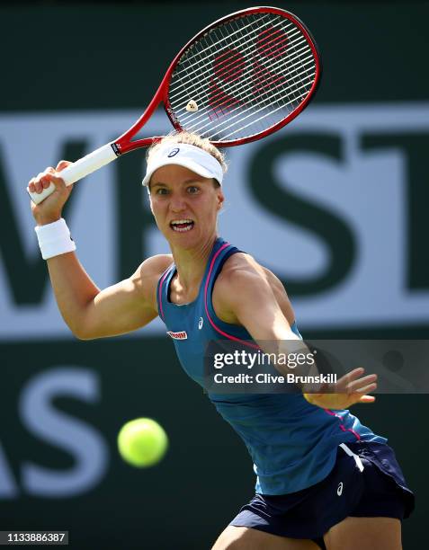 Viktorija Golubic of Switzerland plays a forehand during her straight sets victory against Katie Boulter of Great Britain in their second round...