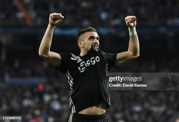 Dusan Tadic of Ajax celebrates as he scores his team's third goal during the UEFA Champions League Round of 16 Second Leg match between Real Madrid...