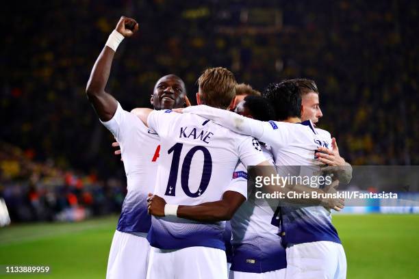 Harry Kane of Tottenham Hotspur celebrates scoring the opening goal with his team during the UEFA Champions League Round of 16 Second Leg match...