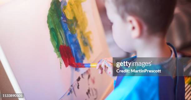 painting fun - preschool student stock pictures, royalty-free photos & images