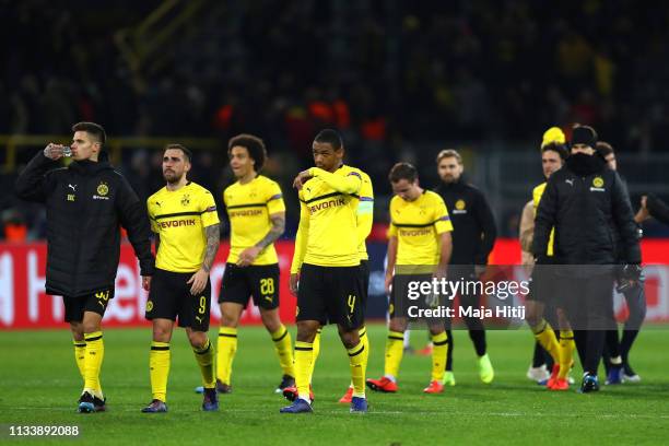 Dortmund players react following defeat during the UEFA Champions League Round of 16 Second Leg match between Borussia Dortmund and Tottenham Hotspur...