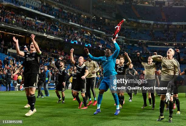 Ajax players celebrate with the fans following the UEFA Champions League Round of 16 Second Leg match between Real Madrid and Ajax at Bernabeu on...