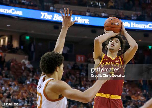George Conditt George Conditt IV of the Iowa State Cyclones shoots over Jericho Sims ...