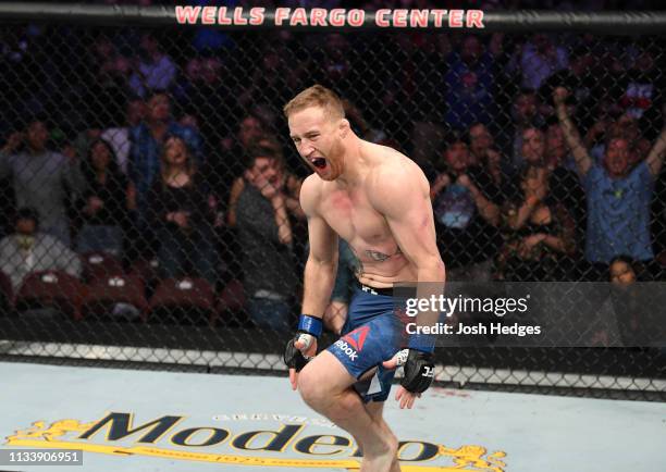 Justin Gaethje reacts after knocking out Edson Barboza of Brazil in their lightweight bout during the UFC Fight Night event at Wells Fargo Center on...