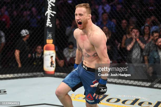 Justin Gaethje reacts after knocking out Edson Barboza of Brazil in their lightweight bout during the UFC Fight Night event at Wells Fargo Center on...